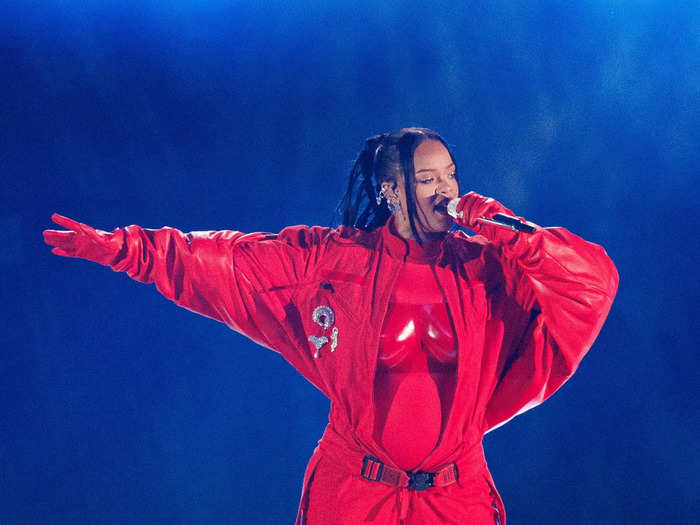 Rihanna wore a red breastplate over a catsuit for her Super Bowl performance in February 2023.