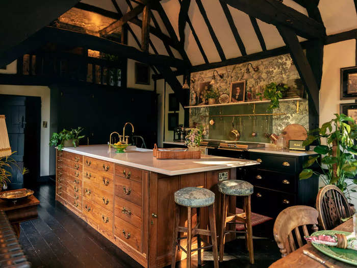 The vestibule was customized to be a functional kitchen island, which included adding a dishwasher.