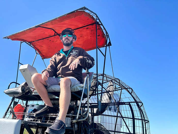 The airboat captain pulls double duty as a tour guide.
