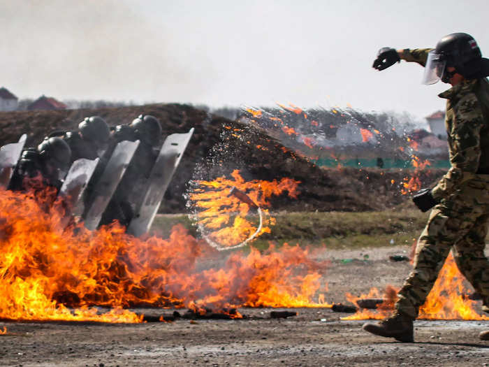 The training aims to build the confidence and skills necessary to handle flammable weaponry in a riot. 