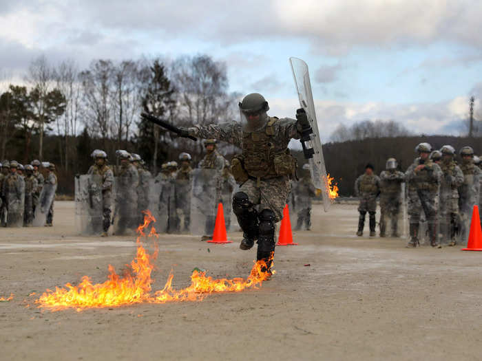 Soldiers are then tested on their ability to perform those techniques to effectively address the flames. 
