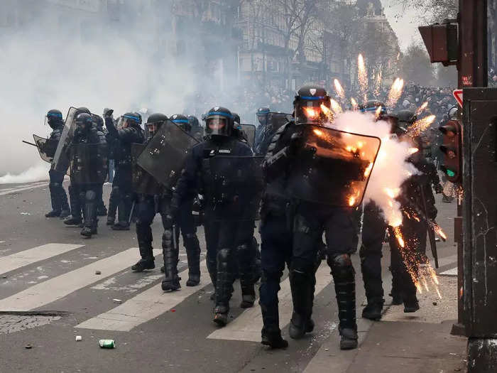 Riot police clashed with protesters over the French government