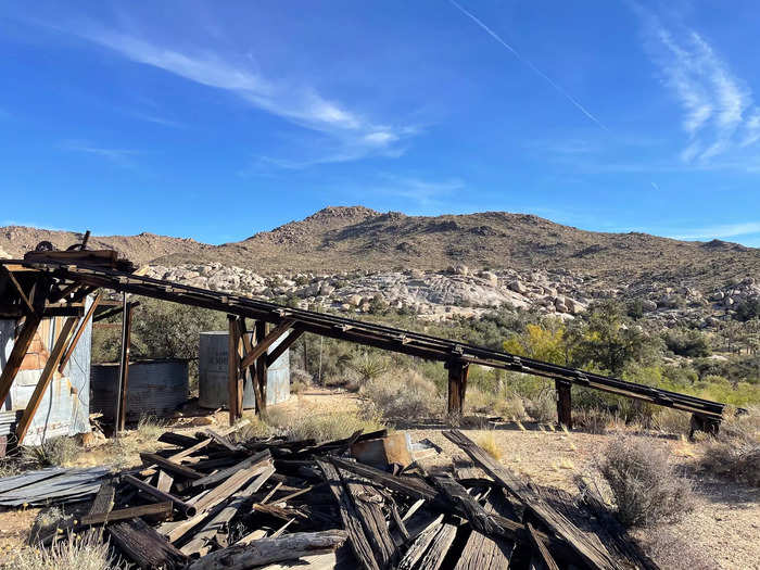 A sign explained that these abandoned buildings and machinery were built during the Great Depression when a second gold rush occurred in the area. 