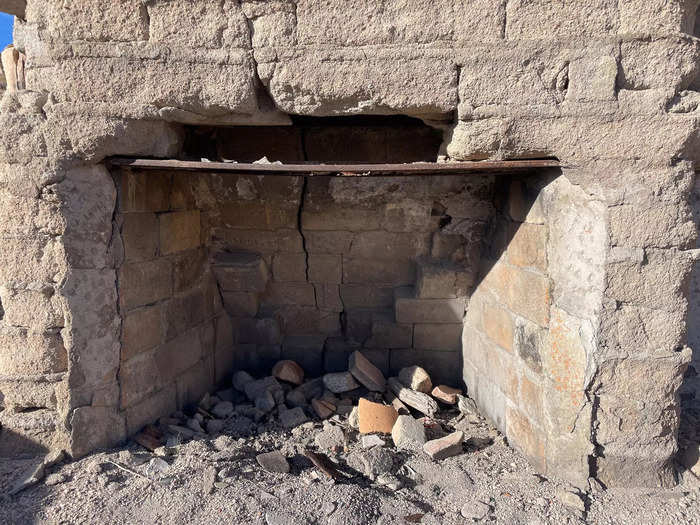 As I explored the site, not much remained beyond a fireplace, foundation, and crumbling walls.