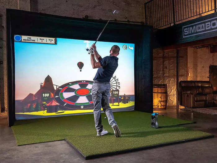 Passionate golfers who want to practise at home can splash out on a $20,000, 13-foot golf simulator made by Foresight Sports.