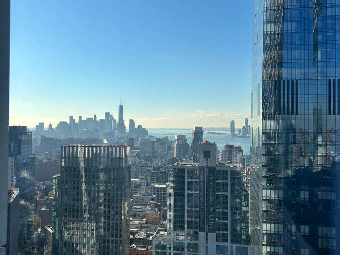 The penthouse had windows all along its perimeter, offering sweeping views of Manhattan. Squinting, I could see the Statue of Liberty.