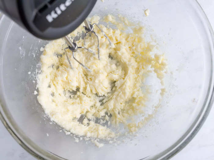 Start by creaming the butter, oil, and sugars.