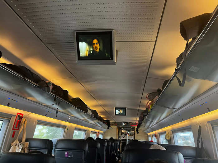 Luckily, movies were playing in the train car.