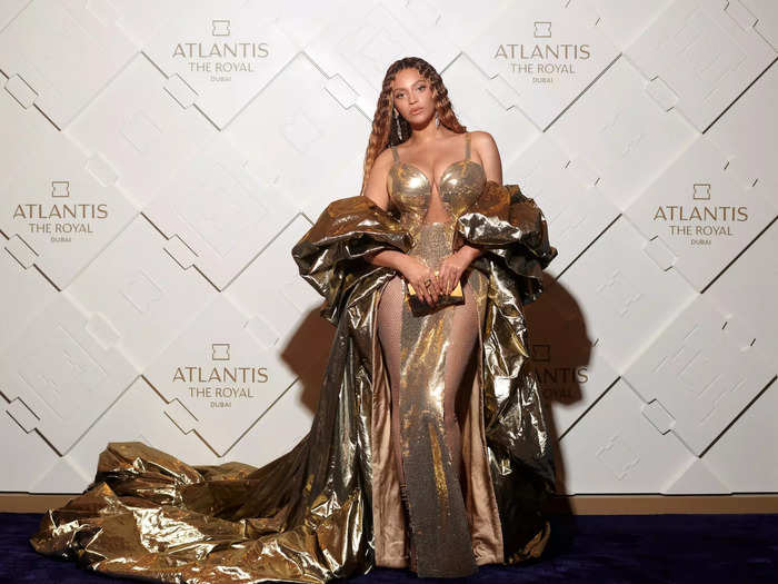 Beyoncé kicked off 2023 in a golden gown and see-through tights.