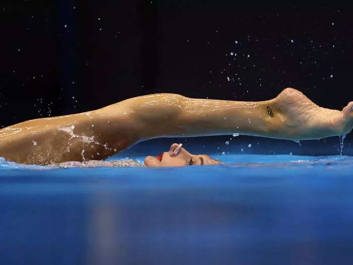 Evangelia Platanioti of Greece extends her leg over her head in an artistic swimming event during the 2023 World Aquatics Championships on July 19 in Japan.