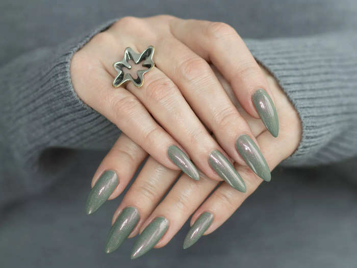 Sage-green nails are trending.