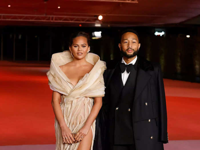 Chrissy Teigen and John Legend could have been mistaken for royalty while attending the Academy Museum Gala in December.