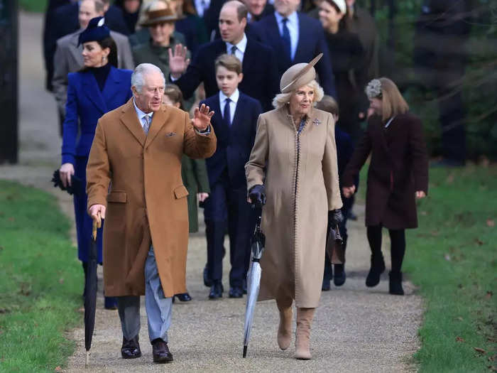 King Charles and Queen Camilla wore matching tan coats.