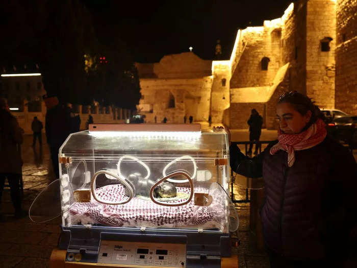 Palestinian artist Rana Bishara created an art piece featuring baby Jesus in an incubator, a tribute to newborns in Gaza hospitals without electricity.