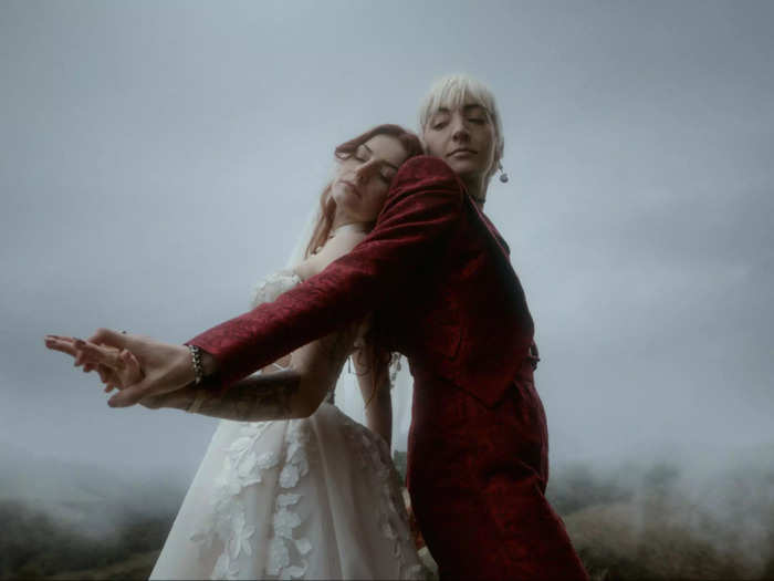 A photo taken in Scotland shows newlyweds supporting each other.