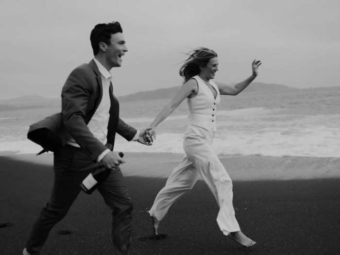 Running on a California beach with a bottle of Champagne seems like the perfect way to celebrate.