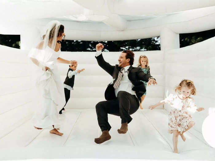 Bounce houses are a must for any kid-friendly wedding, like this one in Missouri.