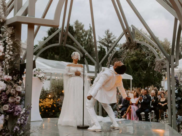 This wedding photo, showing a bride and groom laughing at their Toronto wedding, is pure joy.