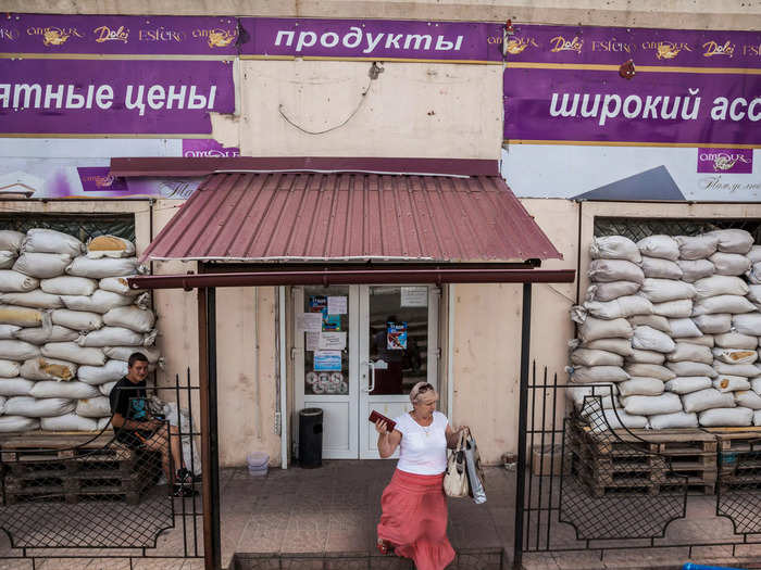 They put sandbags in the windows of shops and schools to shield themselves from shelling