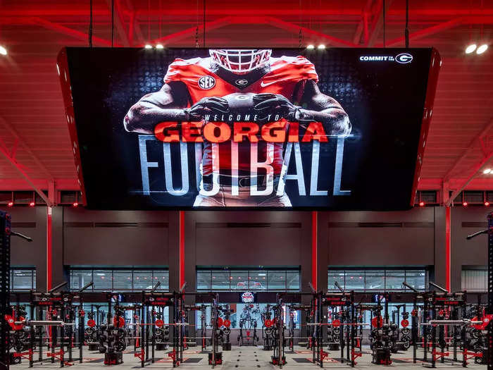 A massive video board also hangs in the center of the weight room.