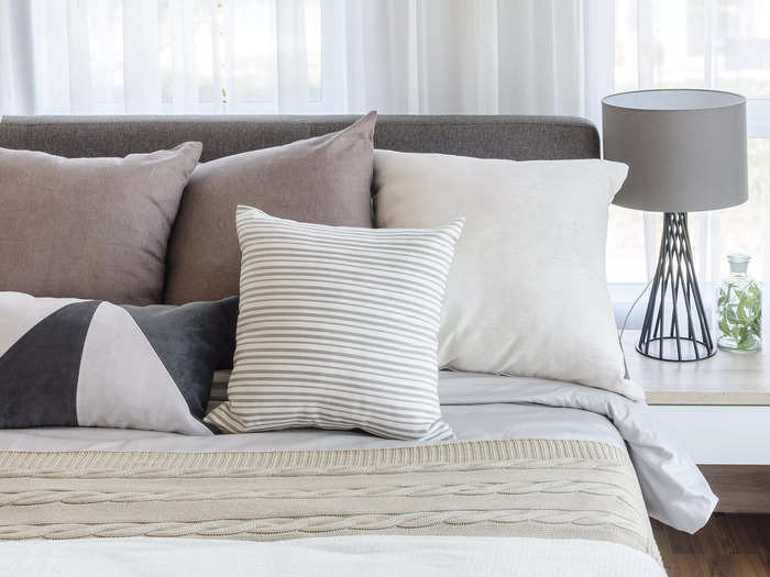 Excessive throw pillows aren’t in style anymore.