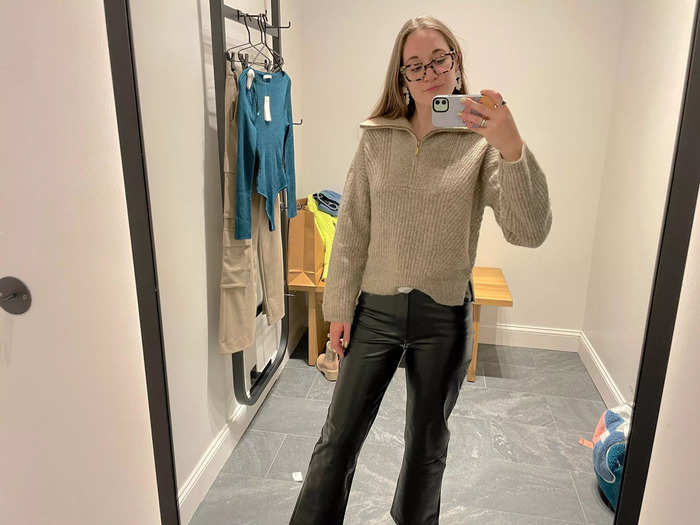 First, I tried on a pair of faux leather pants and a half-zip sweater. 