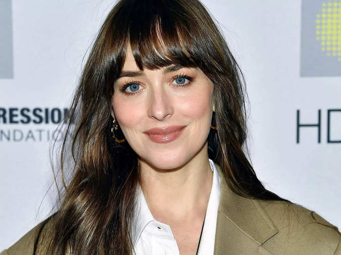 Dakota Johnson is the godmother of his kids.