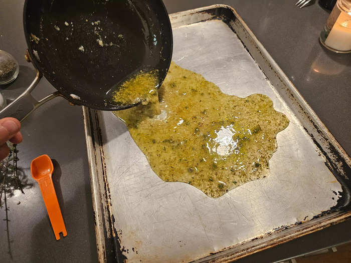 Next, I spread my oil evenly across a baking sheet. 