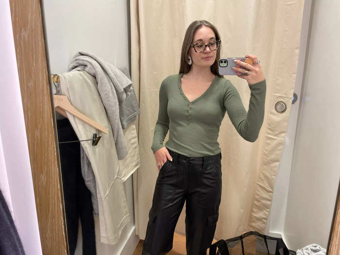 Next, I tried on the faux leather cargos and a henley top.
