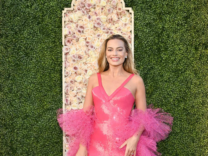 Margot Robbie paid homage to Barbie on the red carpet. 