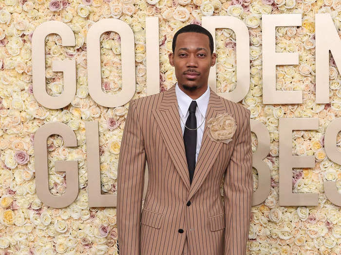 Tyler James Williams chose a striped suit for the awards show.