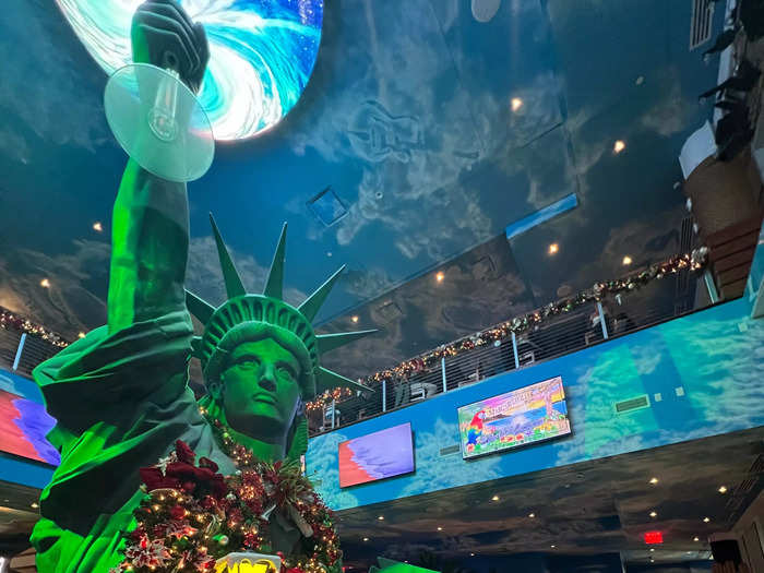 The decor — like this giant Statue of Liberty holding a margarita glass — and commitment to the bit really sets Margaritaville apart.