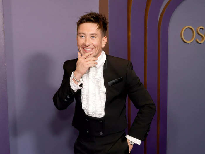 Barry Keoghan wore a Stella McCartney suit over a ruffled shirt.
