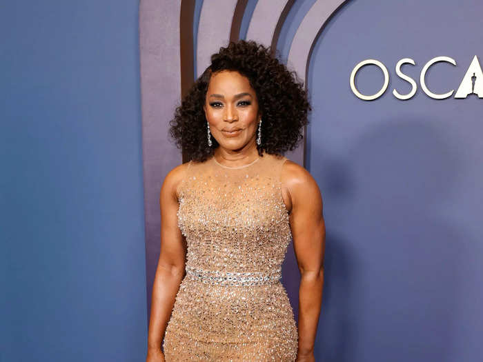 Angela Bassett wore a sequinned mermaid gown with an illusion neckline by Dolce & Gabbana. 