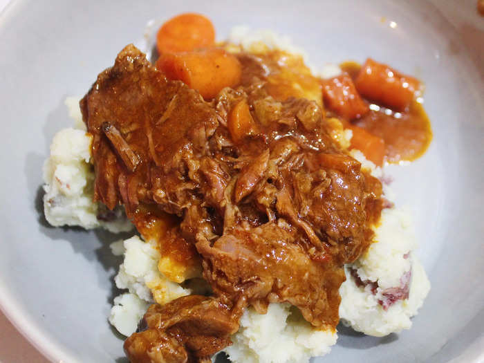 The finished pot roast is the perfect cozy comfort meal for multiple people.