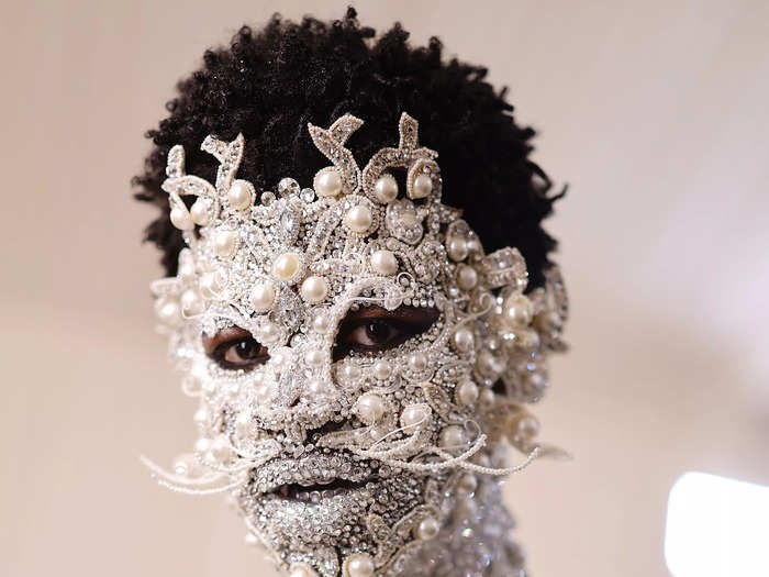 Lil Nas X wore a silver bejeweled look for the Met Gala.