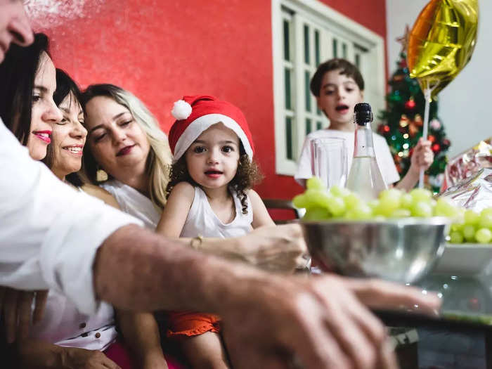 Some Puerto Ricans bring in the New Year by eating 12 grapes at midnight for good luck. 