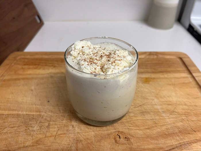 I was too far along to give up, though, so I pressed on. The final step involved pouring a glass of the eggnog, adding whipped cream to the top, and sprinkling it with nutmeg. 