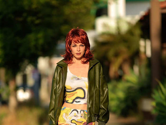 While stepping out again in Los Angeles in May 2023, Fox wore a bright-red wig and colorful outfit.
