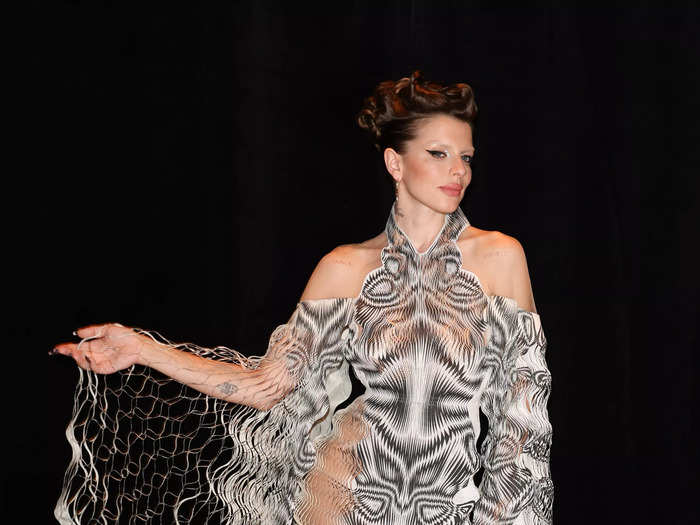 Fox attended the Iris Van Herpen show at Paris Fashion Week in July 2022 wearing one of the designer