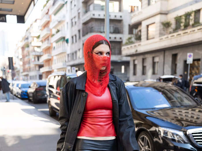 While attending Milan Fashion Week in February 2022, Fox wore a sheer red balaclava and a black micro-mini skirt.