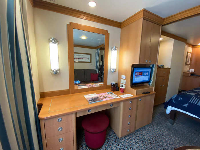 The second half of the room had a vanity and more storage. 