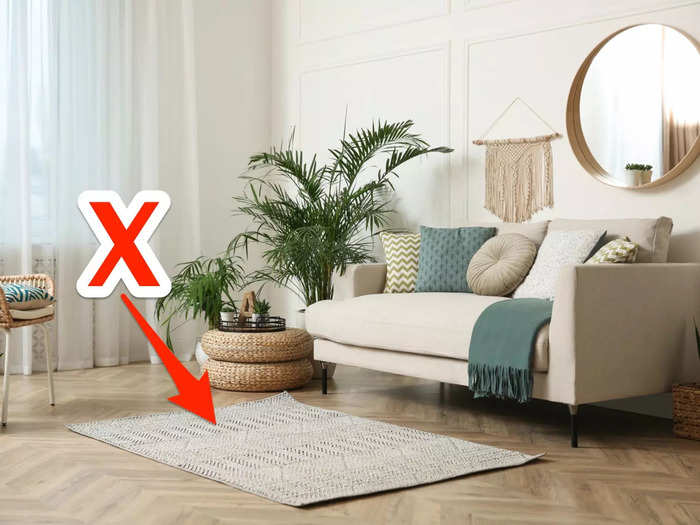 Living-room rugs that are too small can make the space feel messy. 