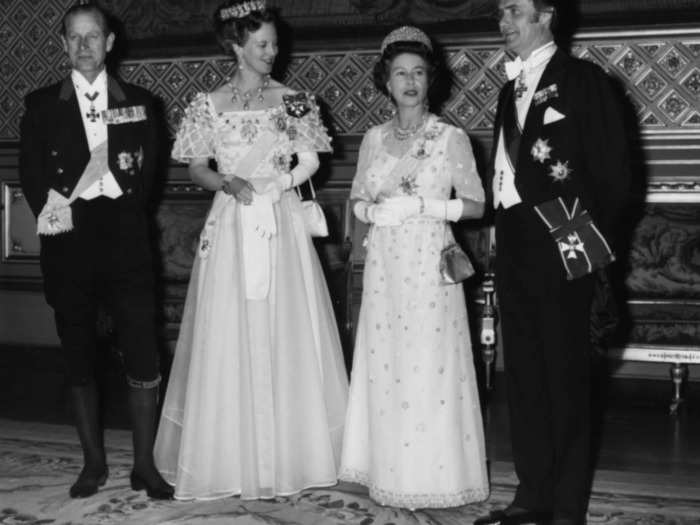 In 1974, Margrethe wore an extravagant ballgown with capped sleeves and a voluminous skirt, accessorizing with opera gloves and a tiara.