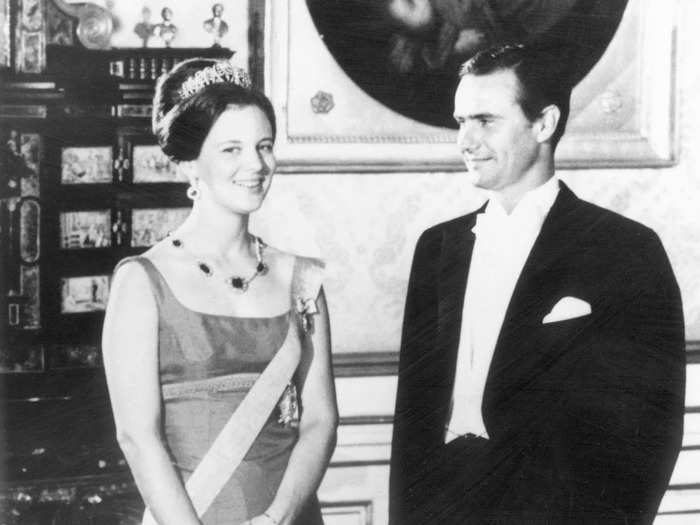 In one of her first appearances after becoming queen in 1972, Margrethe wore a floor-length dress with a scoop neckline and a royal sash.