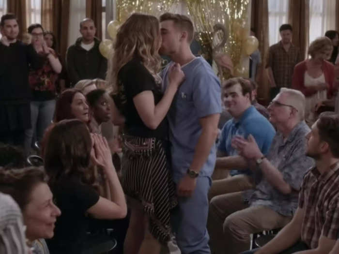 Murphy and Dustin Milligan are almost the same height, so Milligan had to stand on boxes to kiss her.