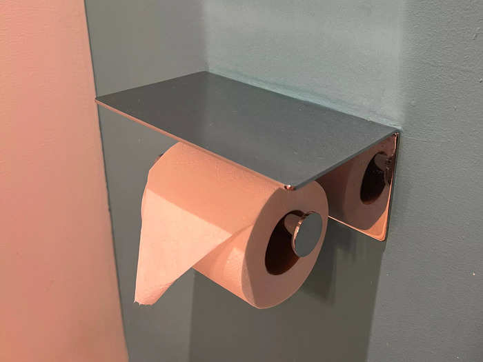 My favorite thing about the bathroom was the shelf above the toilet paper for my phone.