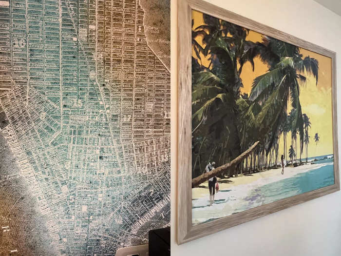 On-theme art adorned the room, including an old-fashioned treasure map of NYC and an island scene.