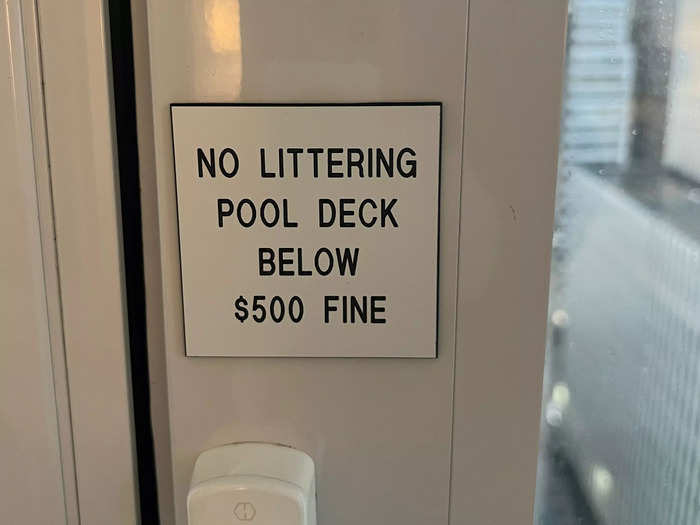 Upon closer inspection, I noticed a sign on the window that noted the pool deck was directly below my room.