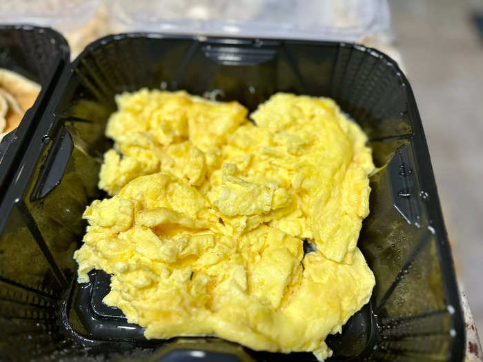 We paid extra to have our eggs scrambled with cheese.